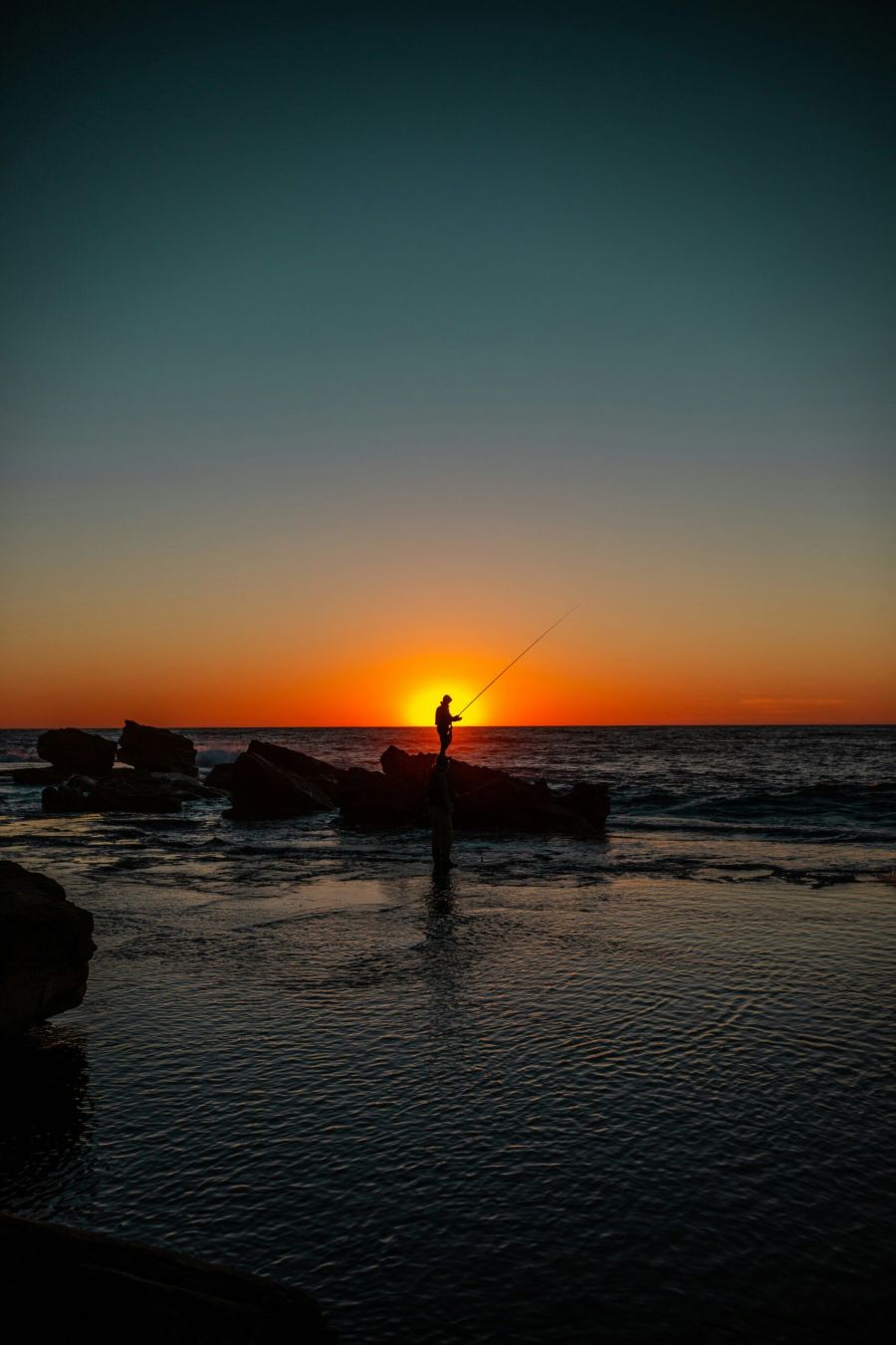 visser bij zonsondergang